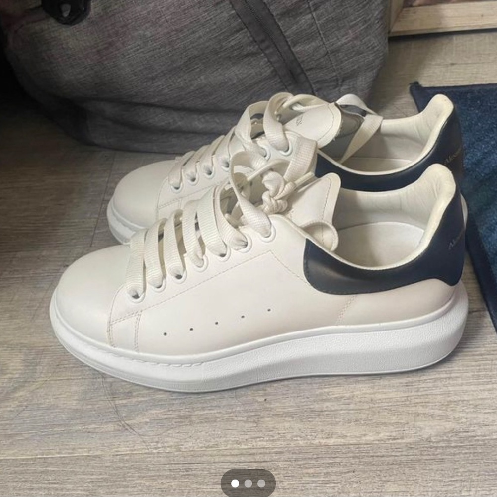 Selling for $350 us. 8 1/2 men 38.5 designer